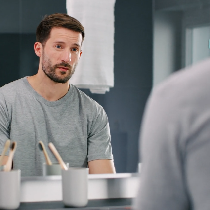 img of a man in his bathroom