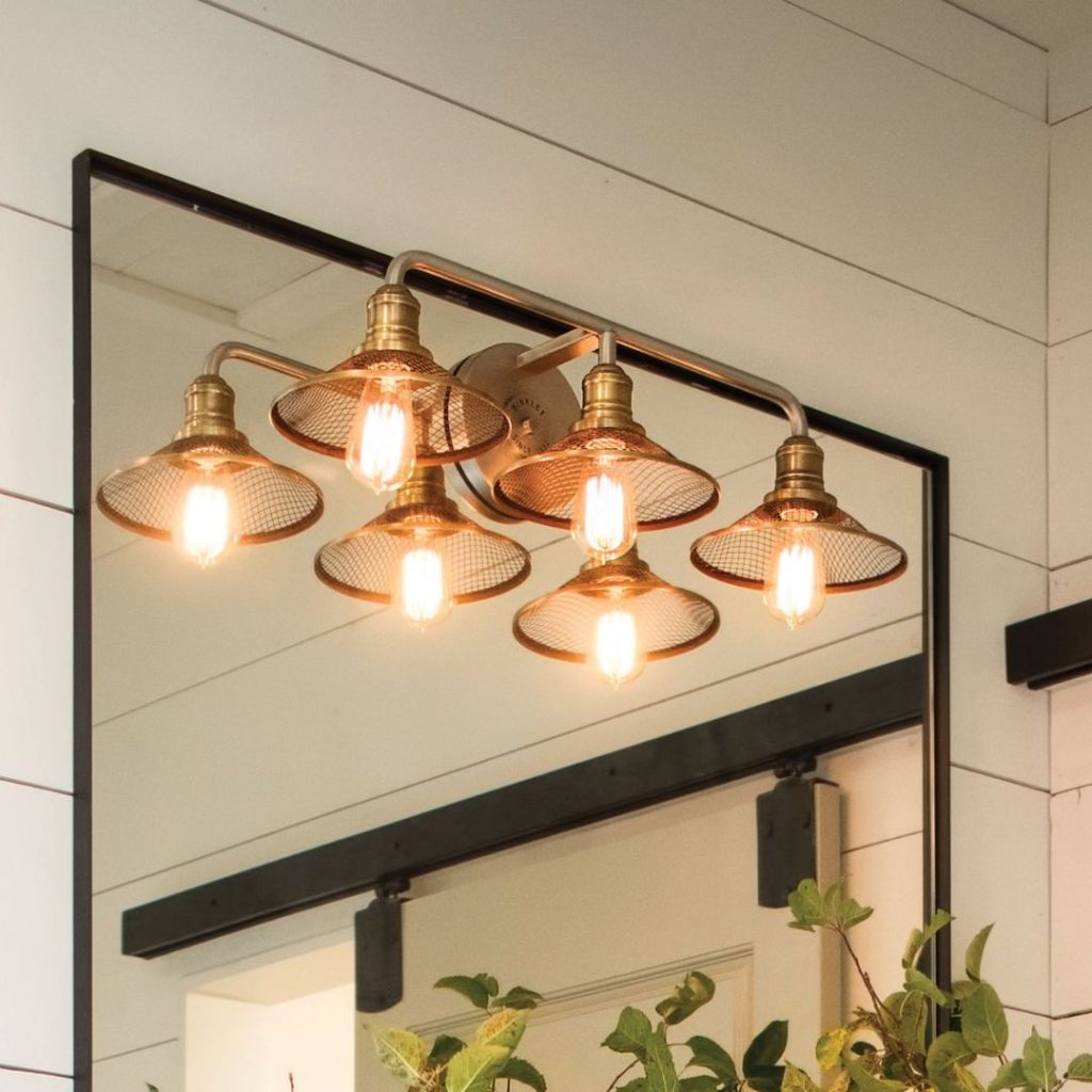 sconces over a mirrow