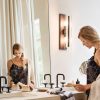 woman getting ready in a bathroom