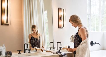 woman getting ready in a bathroom