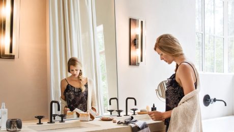 Top Mistakes hero woman getting ready in a bathroom