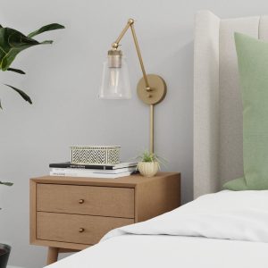 Image of a sconce light next to a bed